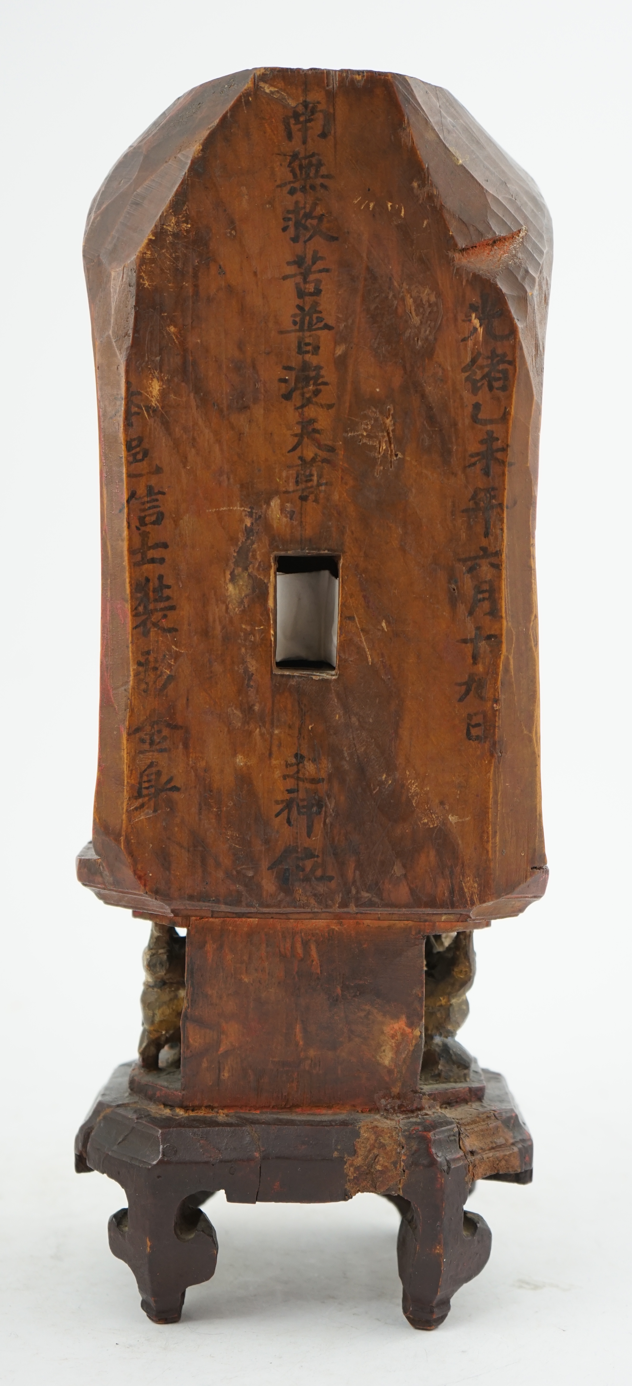 A Chinese polychrome and giltwood seated figure of Guanyin, Guangxu period inscription for the first year of his reign, c.1875